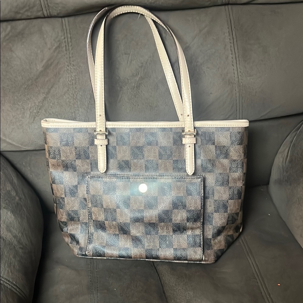 Michael Kors Black and Tan Tote Bag with Structured Design